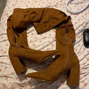 brown knee high heeled boots with pointed toe